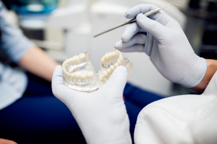 Implants vs. Dentures