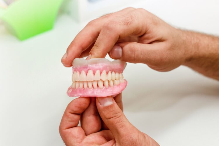 Dental Implants vs Dentures